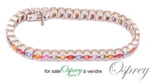 bracelet en or blanc et saphirs de couleurs