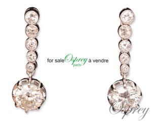 Pendant d'oreille, or blanc 750/000 et platine. 10 diamants.